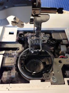 A photo of a dirty sewing machine